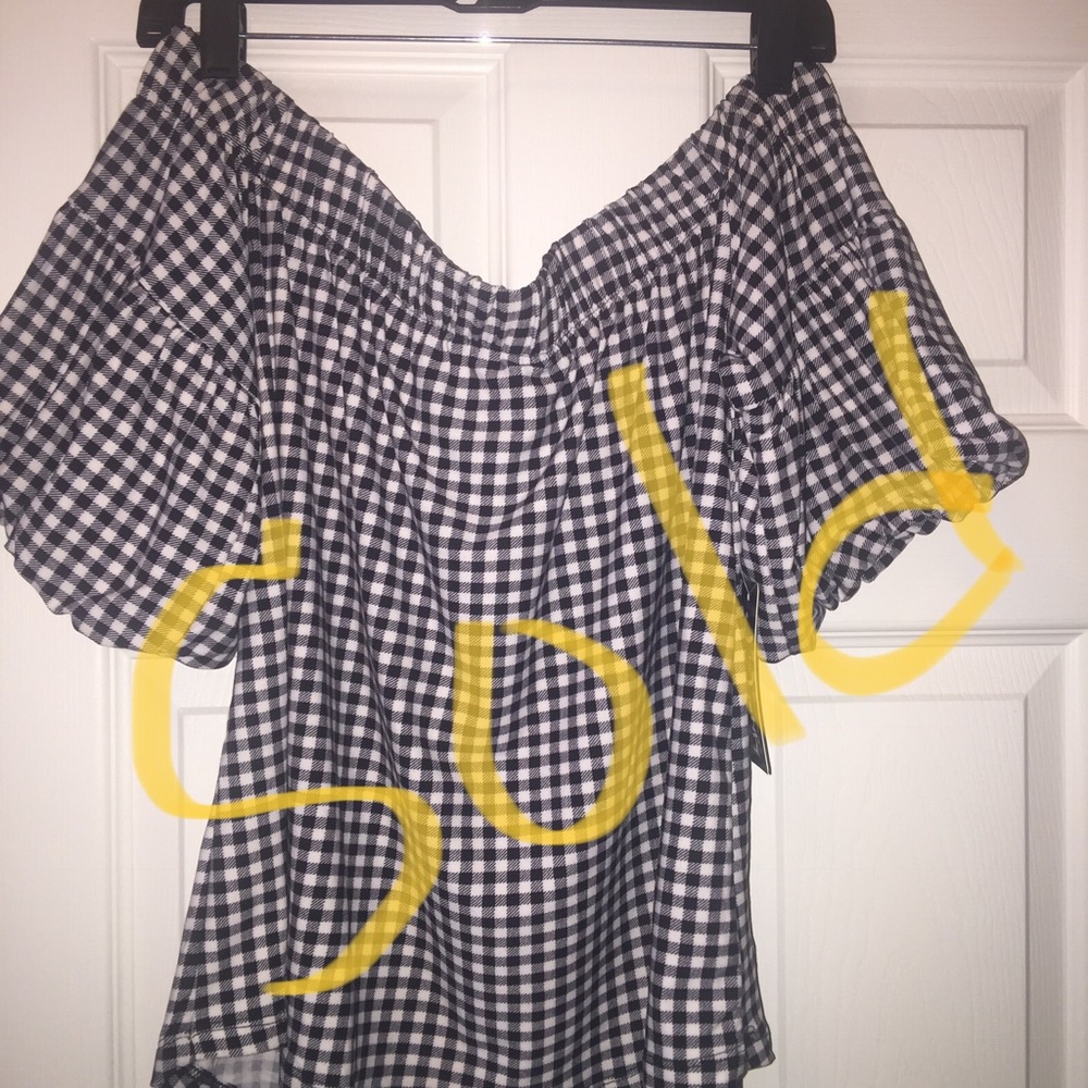 Off the shoulder top.  Large and medium available.